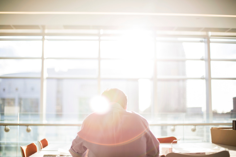 Money-Laundering-learning-from-others Man working at desk